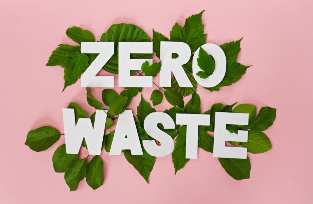 Zero waste sign placed on leaves
