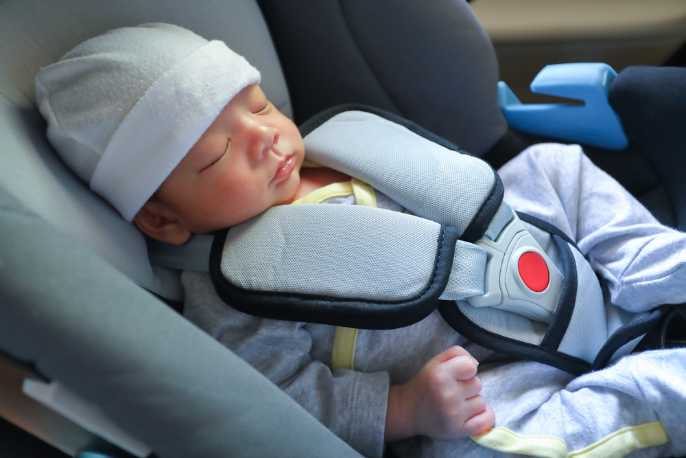 Cute,Newborn,Baby,Sleeping,In,Car,Seat,Safety,Belt,Lock